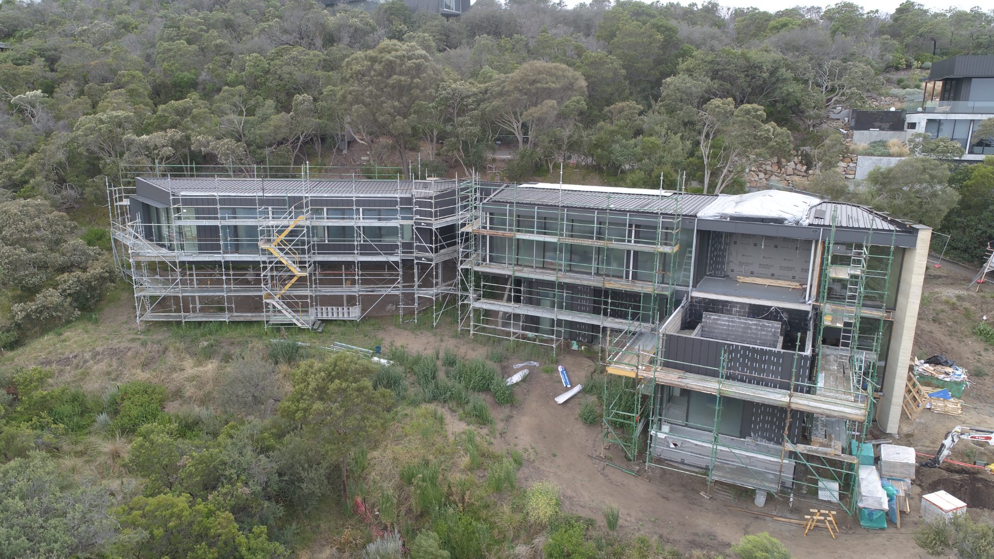 Scaffolded new build in the coastal tea-tree at Cape Schanck, from the air