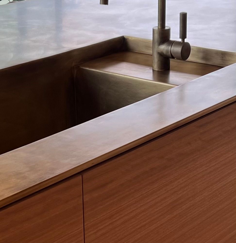Aged-brass sink detail