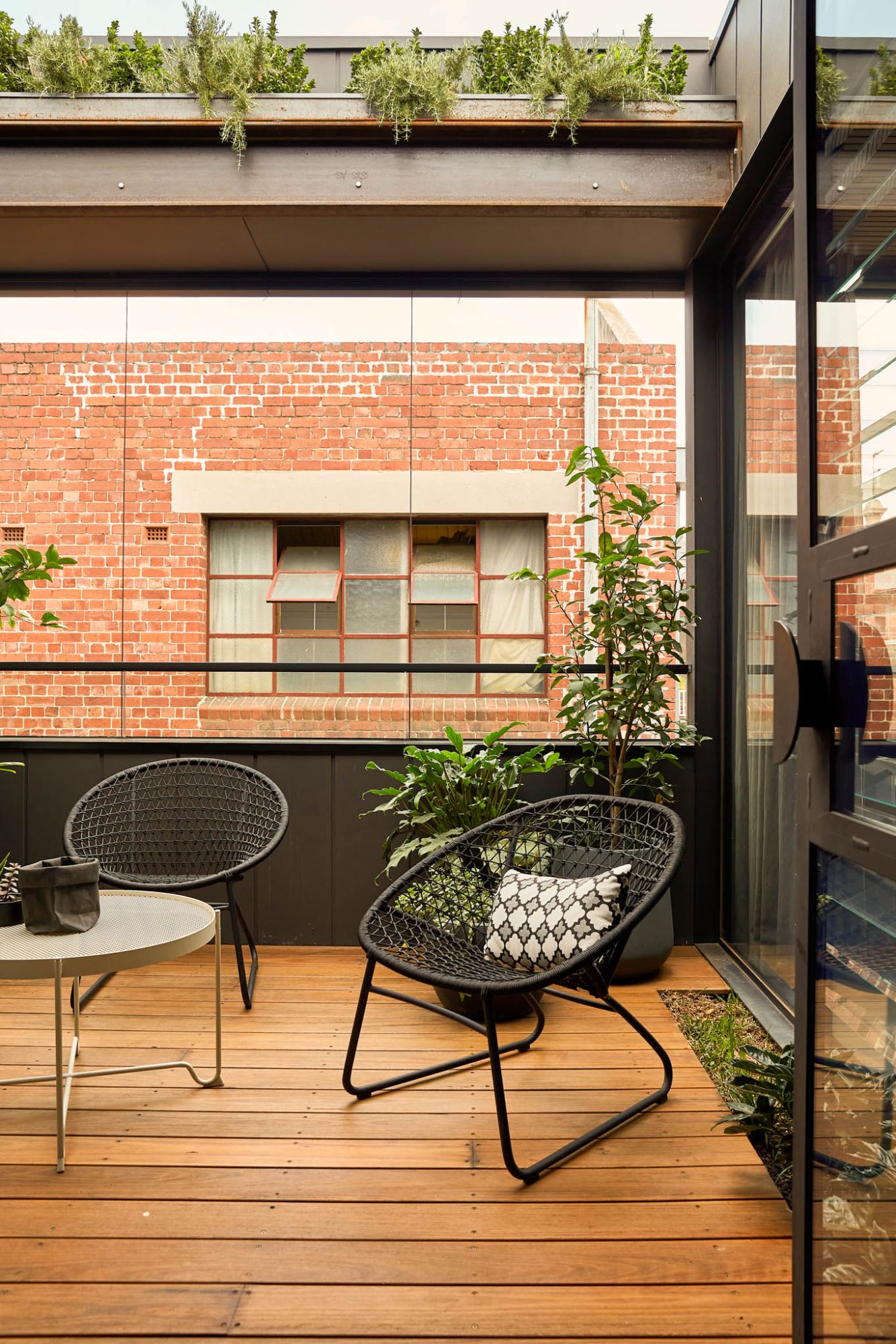 Private terrace off a completed North Melbourne townhouse